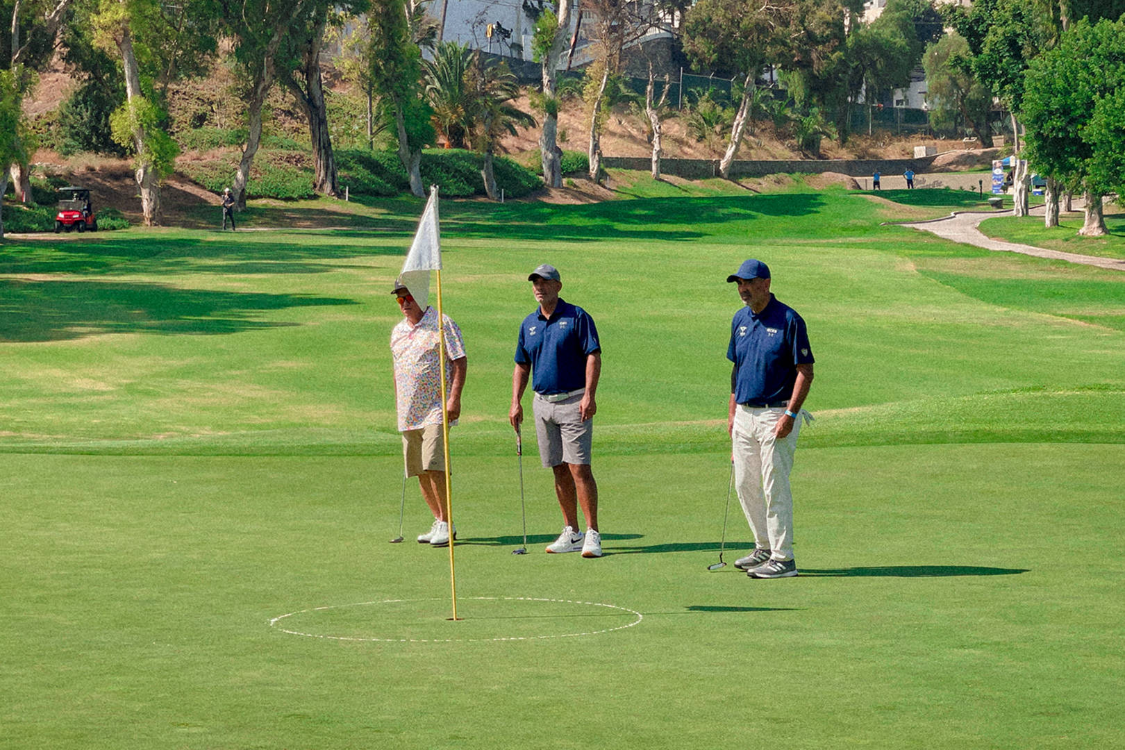 Golfistas en el green del Club Campestre de Tijuana